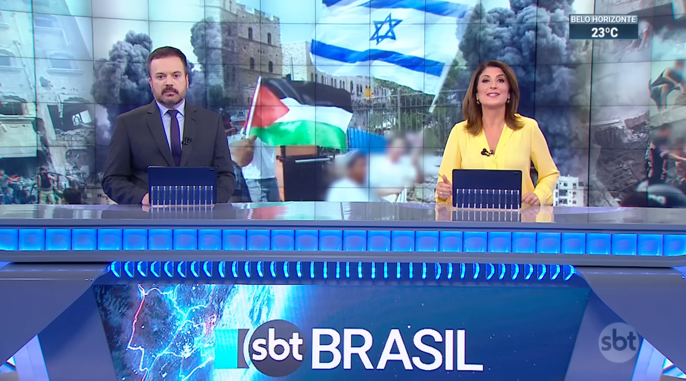 Marcelo Torres e Simone Queiroz no comando do telejornal SBT Brasil (Créditos: Reprodução)